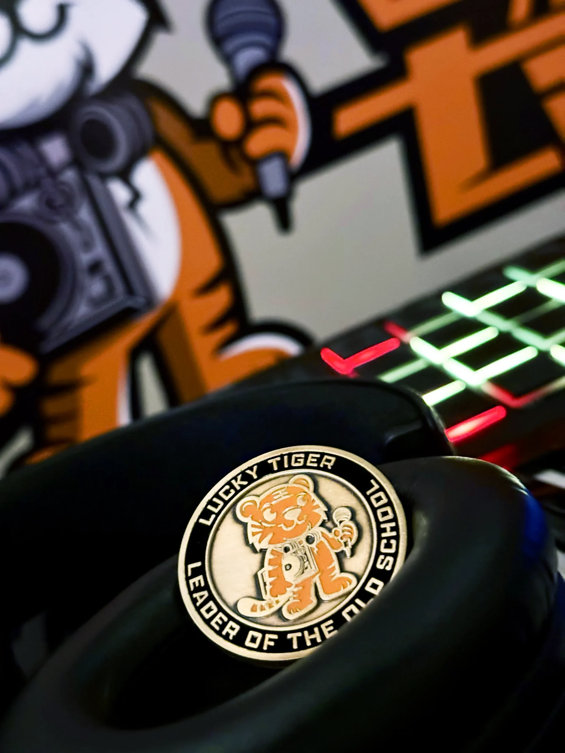 Lucky Tiger coin with headphones and DJ deck in background.